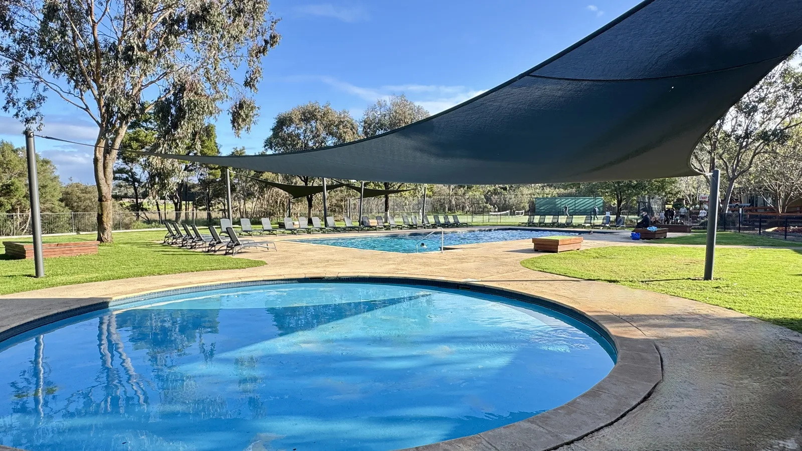 Shaded family pool area at The Nature Resort