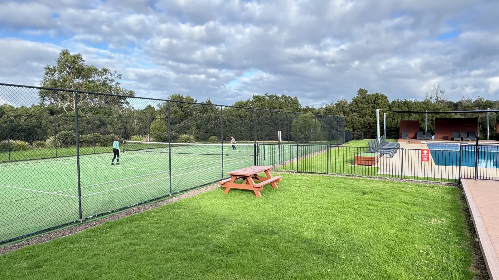 Resort tennis court and recreation area