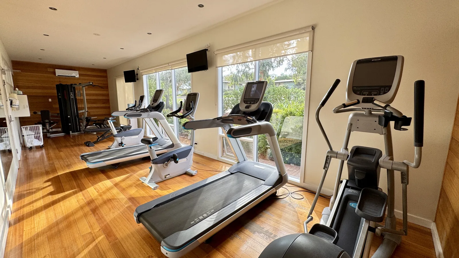 Treadmills, an exercise bike and cardio equipment in the resort gym